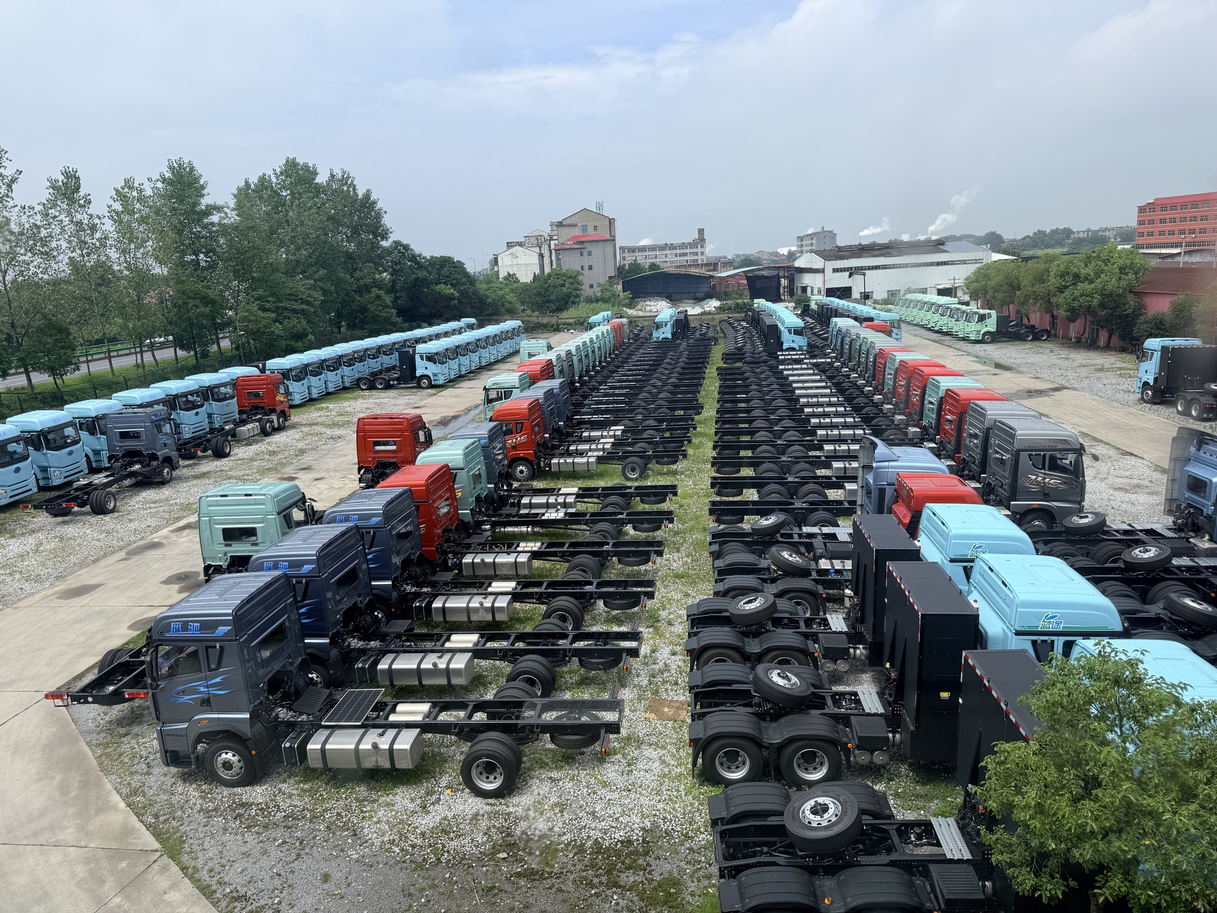 Rows of commercial vehicle chassis at a customer operating site